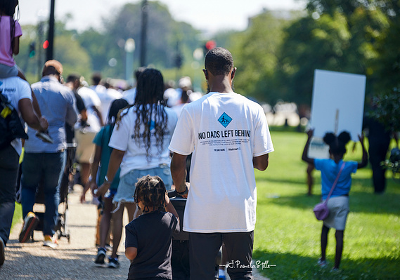 During the March of Dads, marchers could be seen wearing shirts with  the words “No Dads Left Behind” on the back.   