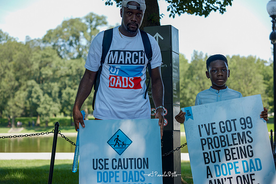 Phil Afoakwah and his seven year old son Theo were among the marches for the March of Dads.  