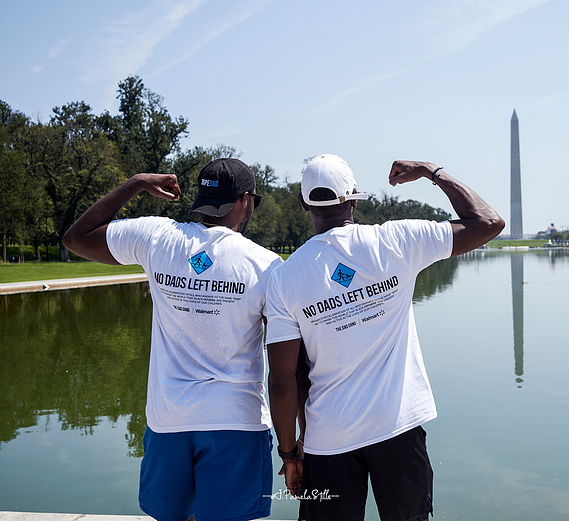 Edward Smith, III, COO (left) and Sean Williams, Founder (right) show off the Dad Gang flex while overlooking the National Mall reflection pond. The pair reflected on the day’s March of Dads aiming to leave no bad behind.   