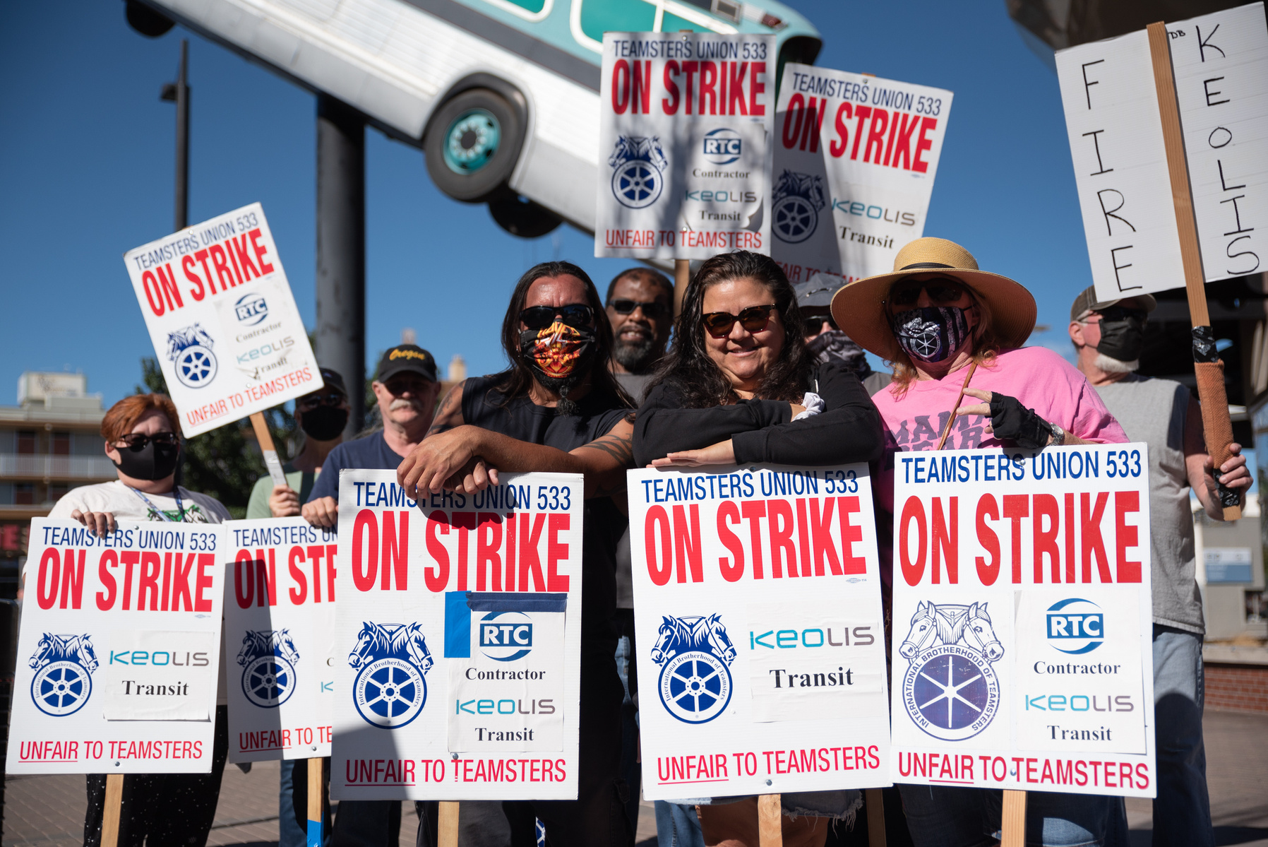 Members of Teamsters Local 533 pose for a portrait during the second of three strikes held in 2021.