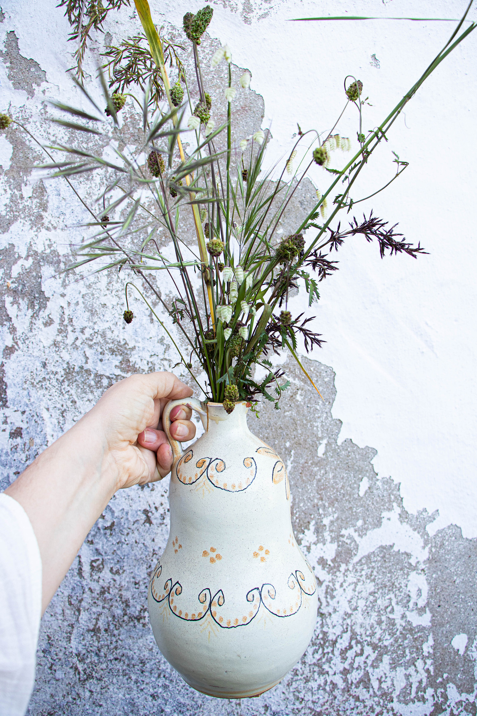 grasses in ceramic jug portugal
