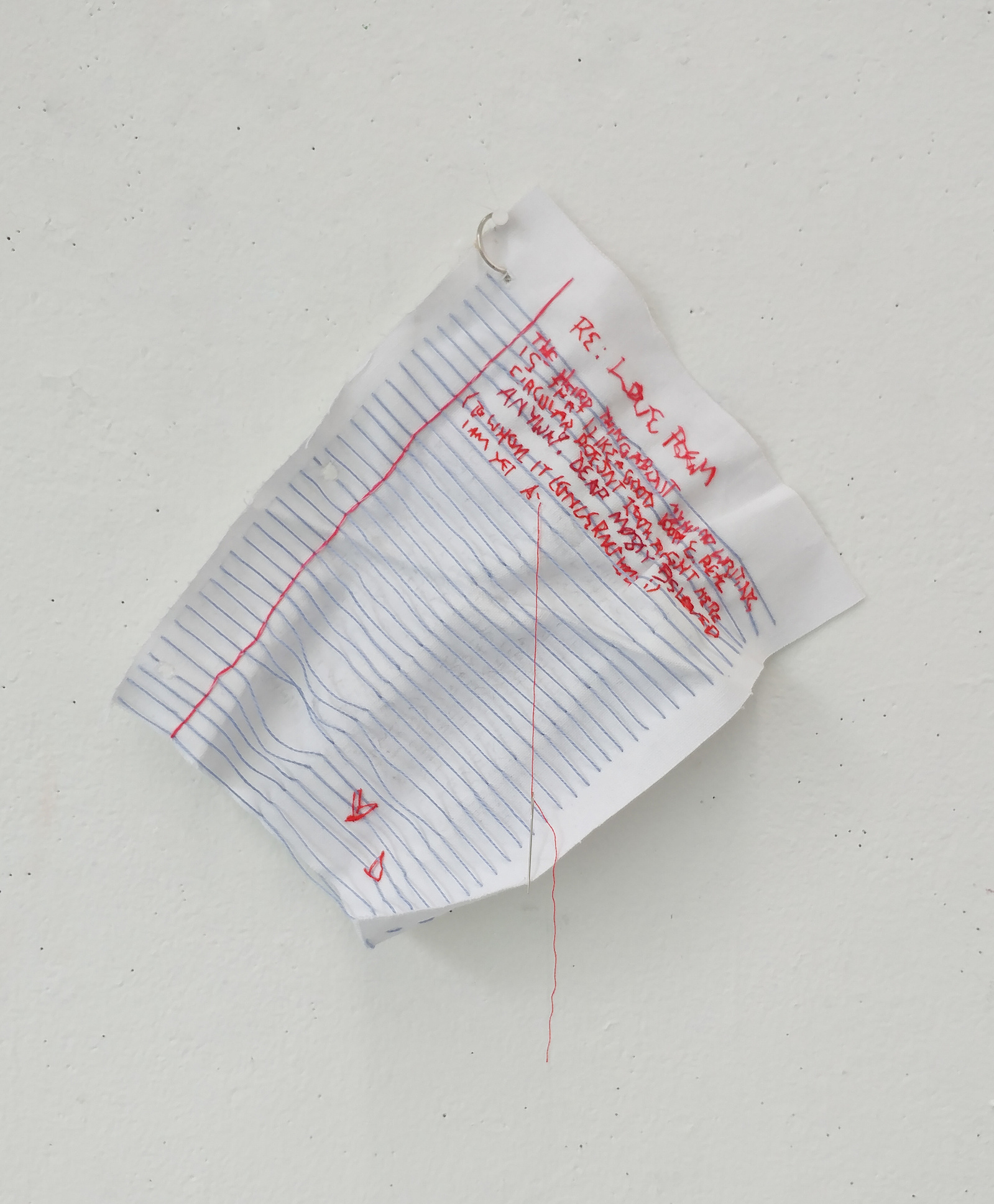 embroidered love letter on canvas that looks like notebook paper