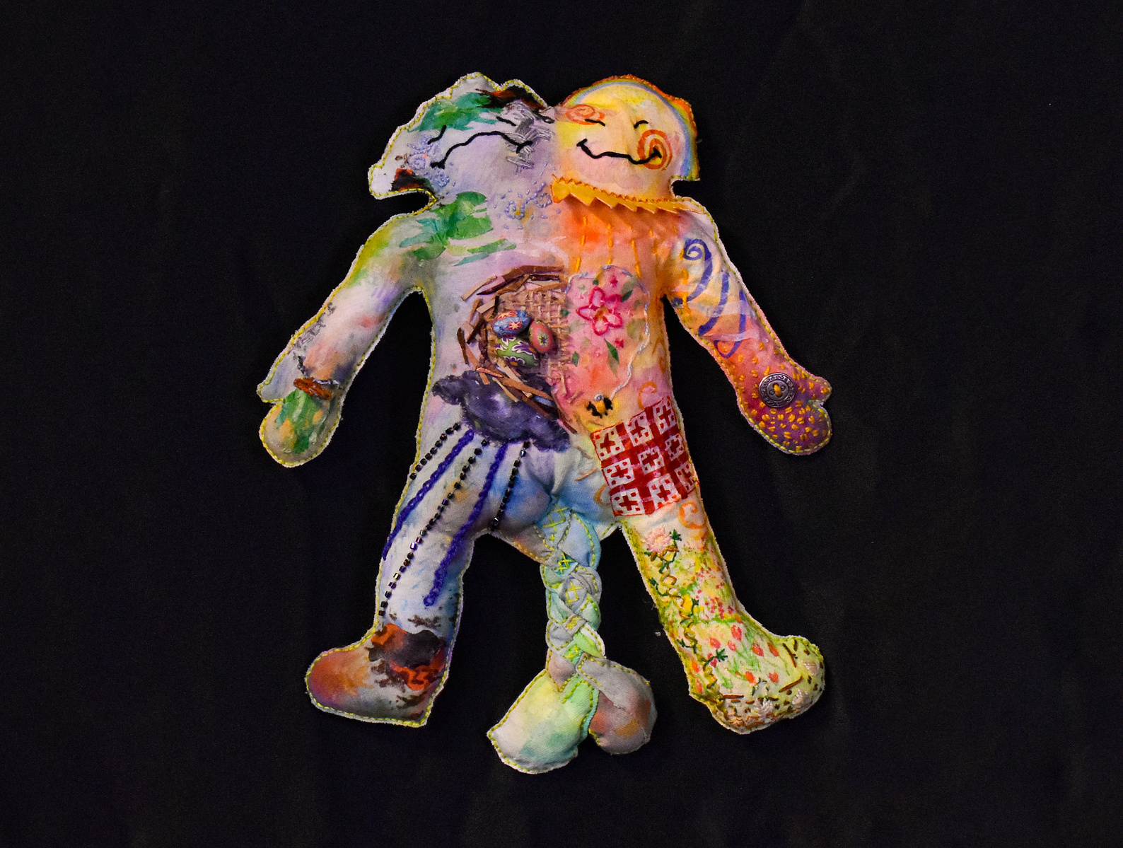 hand stitched cloth doll celebrating spring
