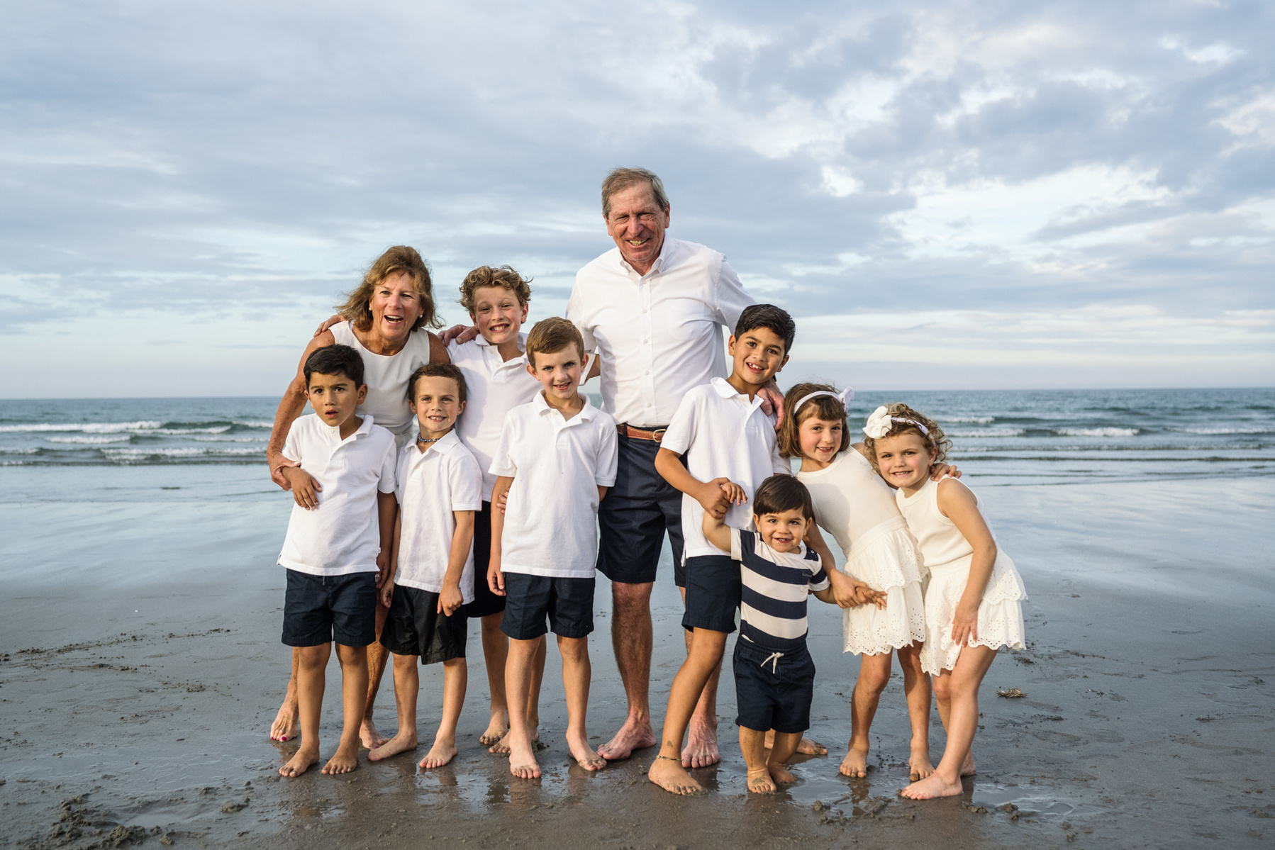 An extended family photo session with Grandparents at Nantasket Beach in Hull MA by Boston family photographer Korri Leigh Crowley