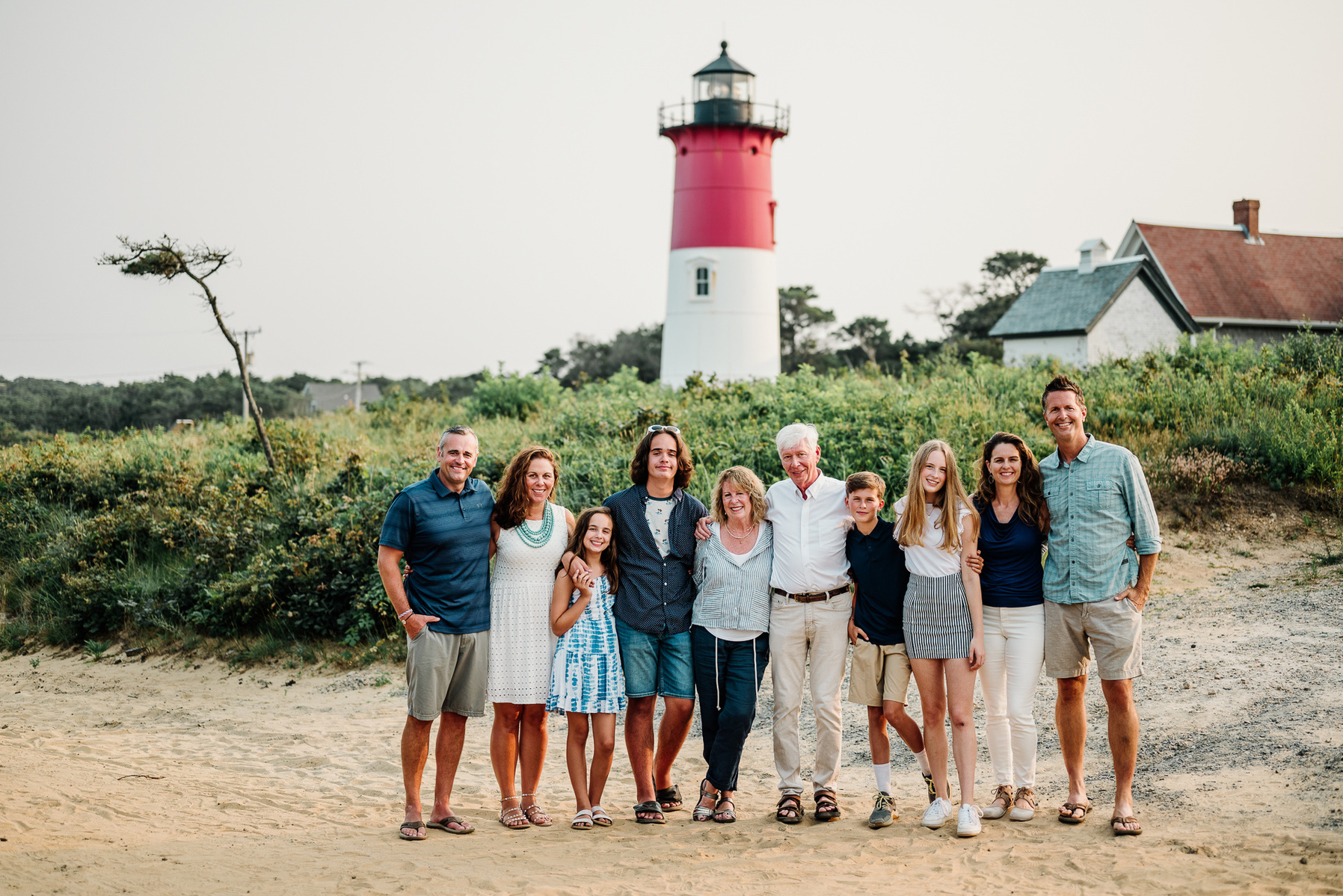 An extended family photo session at Nauset Lighthouse in Eastham on Cape Cod in Massachusetts