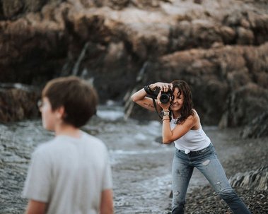 boston family photographer korri leigh crowley photographs her son on a marblehead beach at sunset