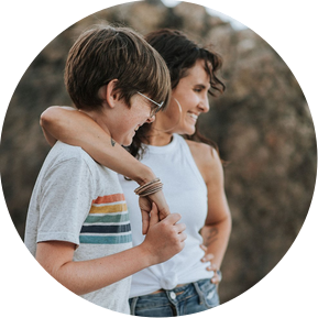 Korri Leigh Crowley stands and hugs her son while they both laugh