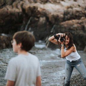 Korri Leigh Crowley photographs her son on a rocky beach