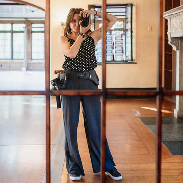 Boston Wedding photographer Korri Leigh Crowley takes a photo of herself in a mirror at a Willowdale Estate wedding