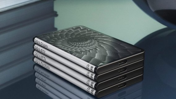 Artwork from Jen Stark's Vortex collection displayed on a stack of Ledger Stax devices.