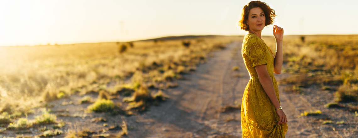 Amanda Ellen Gibbs Photography, Marfa Texas, Texas sunset, woman in yellow dress, open Texas field, yellow wedding dress