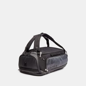 black grey and blue utility outdoor backpack laid down with straps hanging up on white background