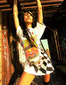 moody young woman with long brunette hair weaves wearing colorful white McDonalds nascar corset t shirt standing inside rectangular metal frame reaching above her head hanging on to rusty metal frame photographed by william gormley