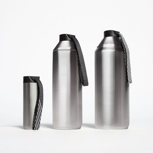 three aluminum stainless steel brushed water bottles of different sizes