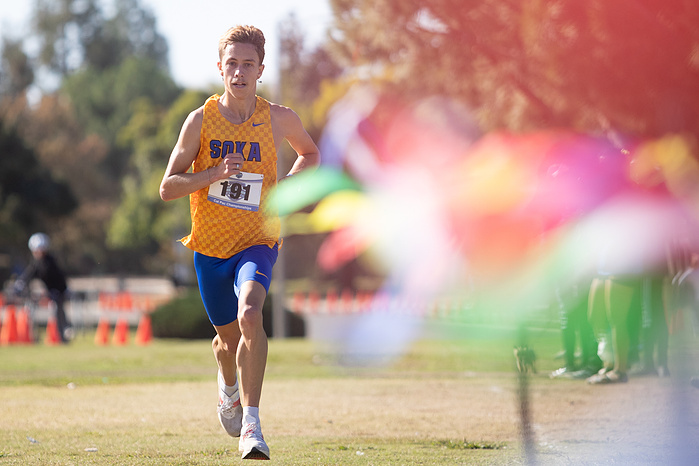 Andre running into the finish line of the CalPac conference championship at Woodward Park in Fresno on October. 28, 2024. After a fourth place finish in 2023 before, Andre would go on to win the 2024 conference title by 45 seconds.