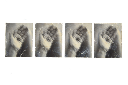 Four times a blurry hand in motion with a eerie feeling to it