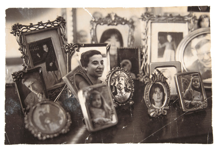 Different pictures from a family displaying a family portrait with the figure of Jesus Christ in the very centre