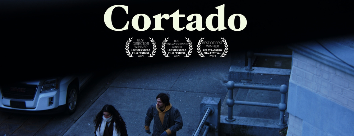 A young, cross-cultural couple already on shaky ground is tested when an interaction at a local restaurant causes even more tension between the pair. Cortado is short film that handles nuance, tension and explosive drama.