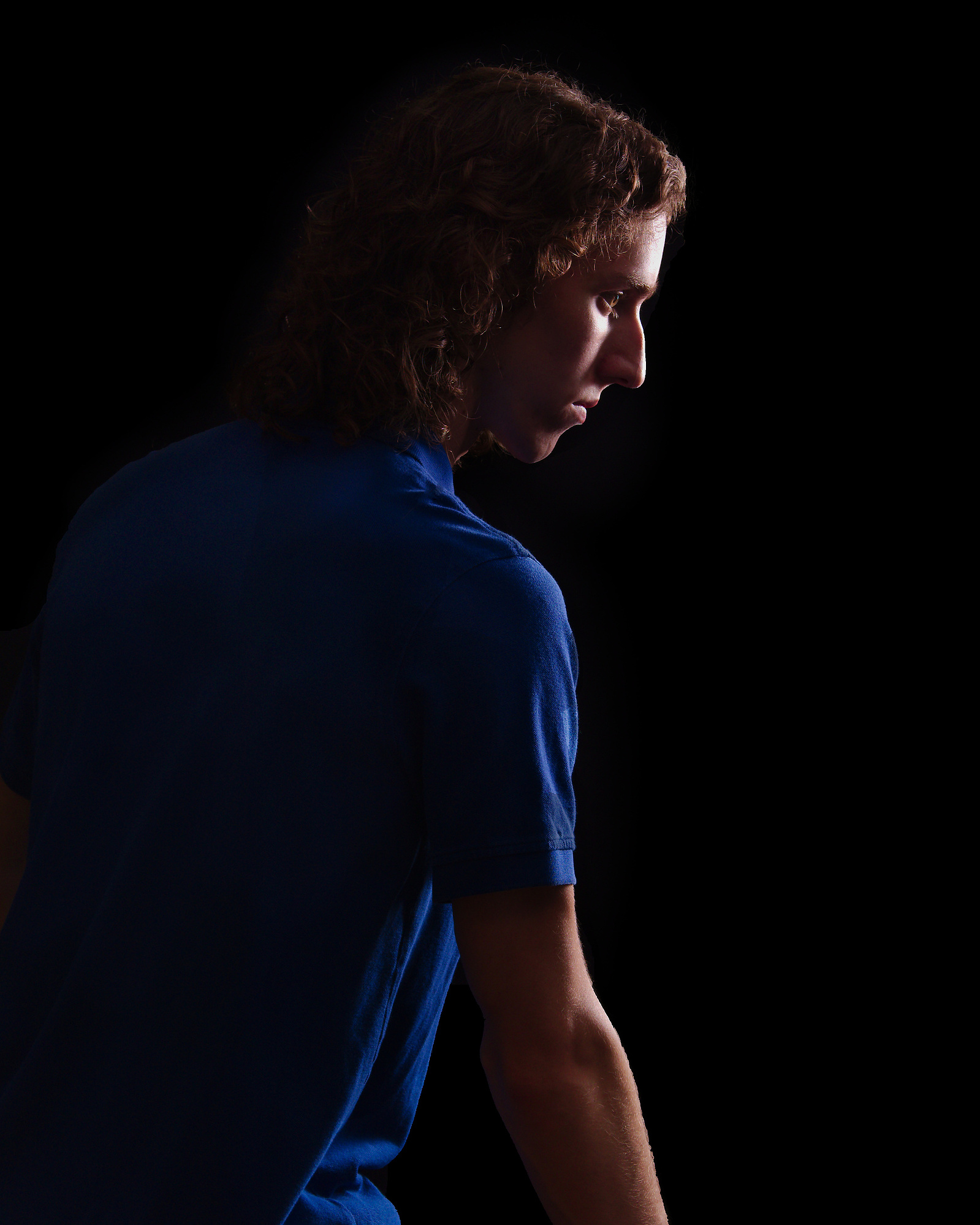 Image Description: "A vertical crop profile picture of a young man on a black background."