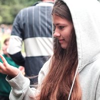 Young lady feeding the birds in Hyde Park