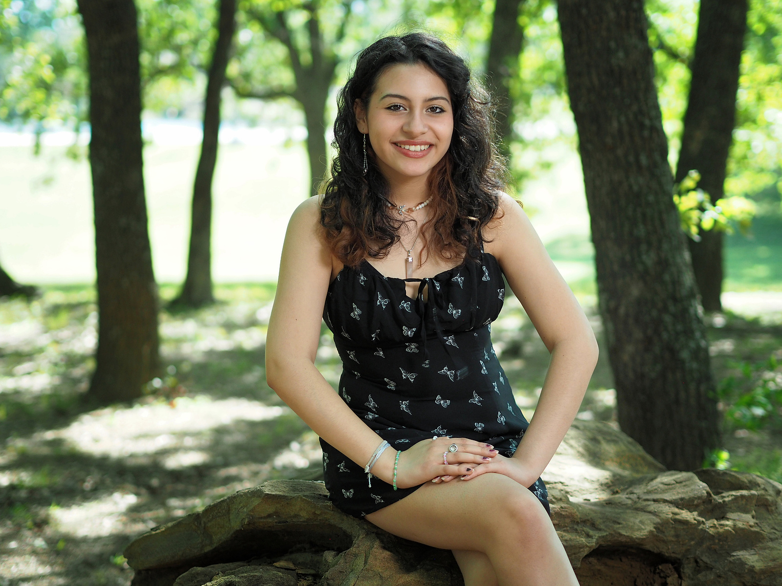 Teenage girl outdoors portrait under trees using an ND filter and the EM5 II