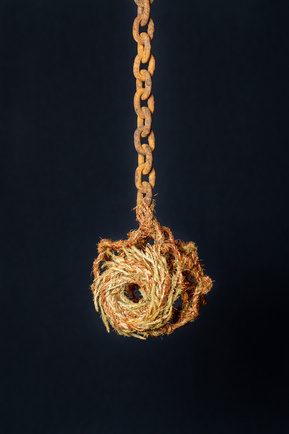 Sanctuary: hairmoss netting and rusted steel chain, by basketmaker Sarah Paramor