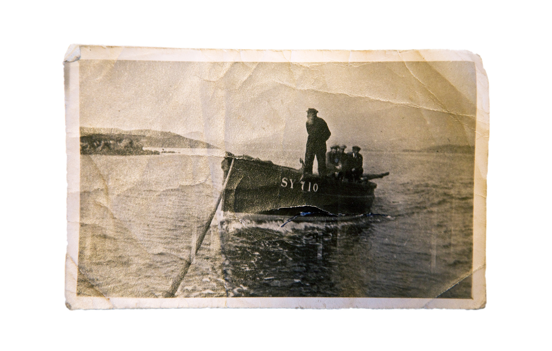 Scalpay, Outer Hebrides, Scotland.
While in Scalpay I saw this picture of my great-great-grandfather, Alistair Cunningham, a looming man with a white beard, guiding his boat through the foggy water.