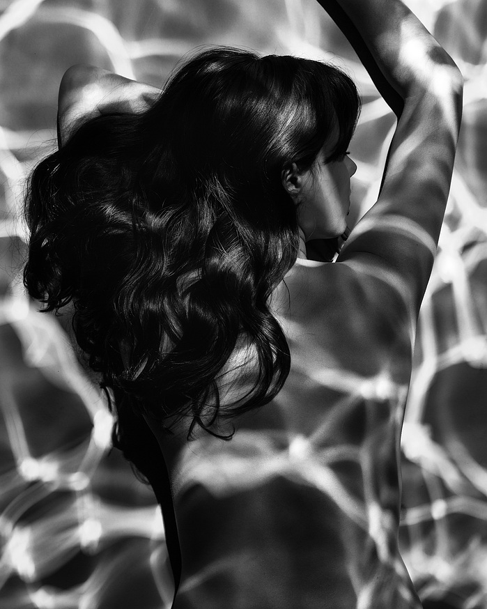 Water reflections on skin