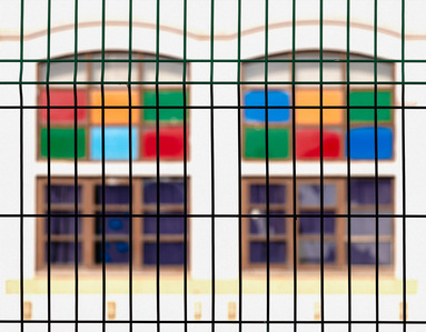 &quot;Early in the morning, while walking through Vila Real de Santo António — a small town in Portugal just across the border from Spain — I spotted these two windows through the bars of a school fence and was struck by their colours.&quot;