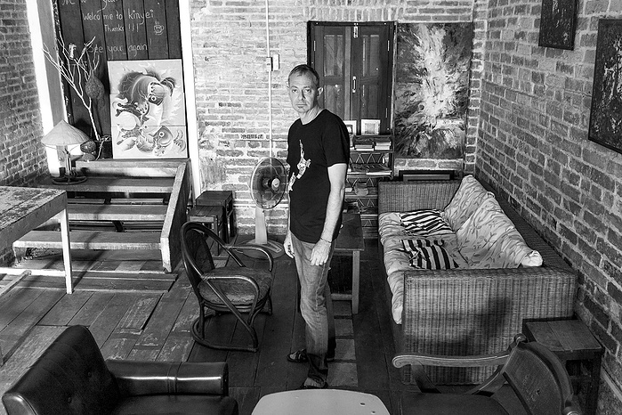 Black + White Fine Art Portrait of a man in his late 50’s, with a cafe scene in the background.
Fine Art Portrait
Black + White Photography
Fine Art Gallery
Artistic Photography
Ring Light Photography