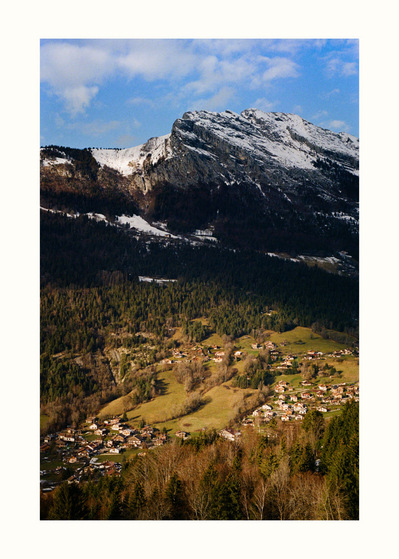 Fine Art print edition of 7 signed & numbered. 50x70 or 30x40 cm on Hahnemühle Bright White paper. Olivier Montay photographer. Snowy mountain overlooking a valley lighted up by autumn light and colors. France, haute-Savoie. Film photography