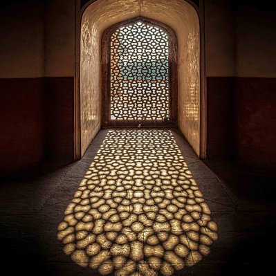 A high quality print available to buy of an intricate Indian window at Lodi Gardens in Delhi.