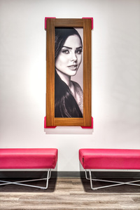 Upholstered bench seating with framed image