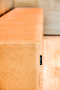 Upholstered bench detail for Indie Studio Suites.