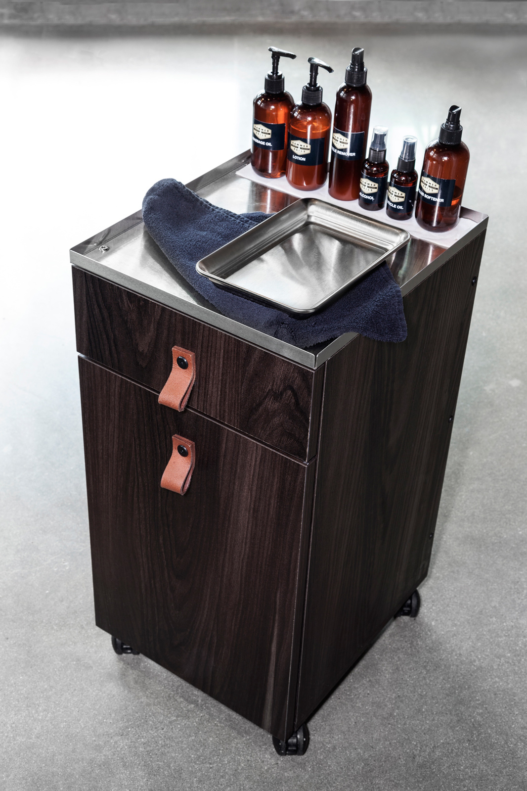 Rolling work pedestal for Hammer and Nails Grooming franchise