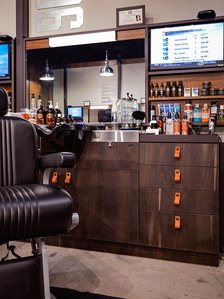 Barbering wet station design with drawers, mirror, tool holder, light and mirror.