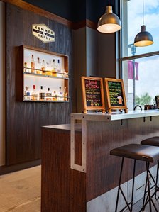 Bottle display and bar for mens grooming brand.