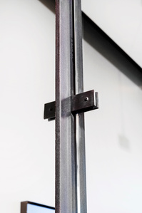 Glass wall metal frame connection detail
