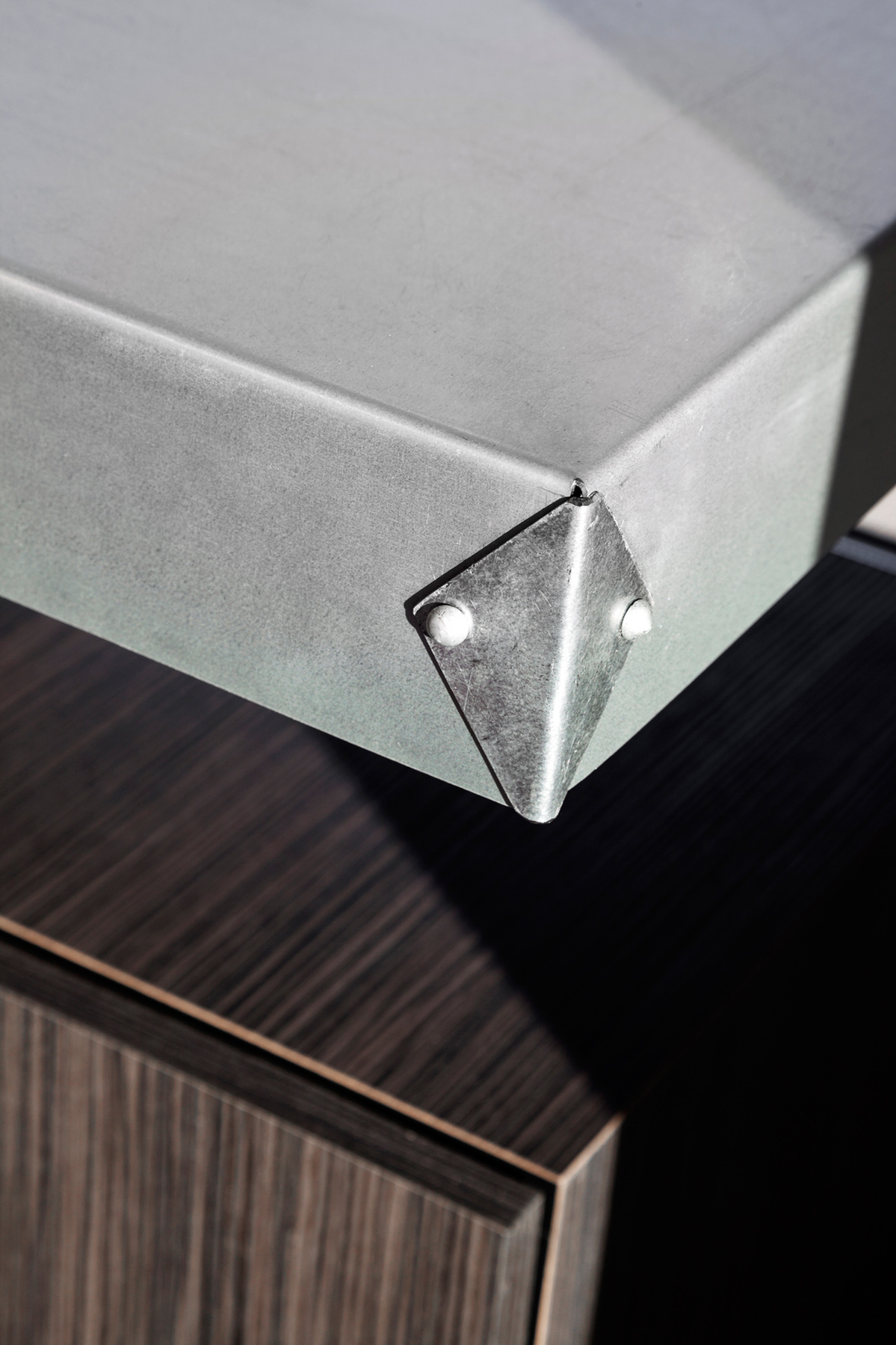 Salon cabinetry metal counter top detail