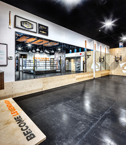 Wall cladding, mirror wall and environmental graphics for Legends boxing franchise.