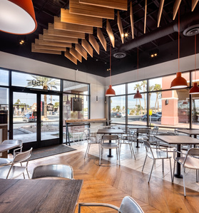 Dining room furnishings and ceiling treatment in Farm Basket restaurant.