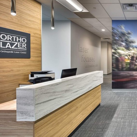Interior design, store fixture design and manufacturing for the Ortholazer franchise.