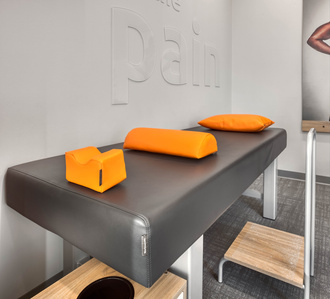 Treatment bed and cushion design and manufacturing for OrthoLazer health and wellness franchise.