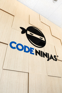 Interior branding and logo sign for Code Ninjas franchise
