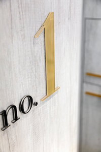 Sign and graphics detail for DryLuxe salon chain