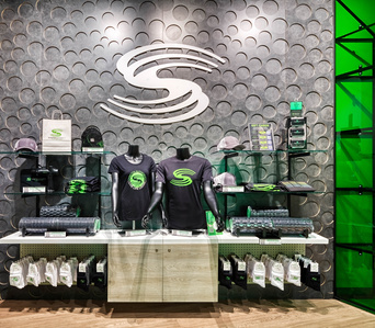 Textured wall panels and Stretch Authority logo over retail system