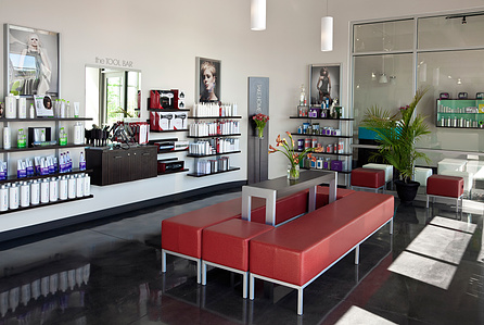 Reception and retail fixtures for Paul Mitchell the School corporate chain