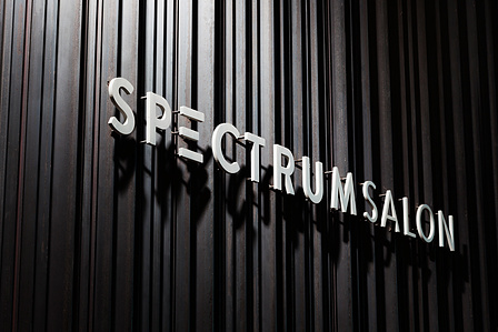 Hot rolled angle iron feature wall with custom aluminum logotype