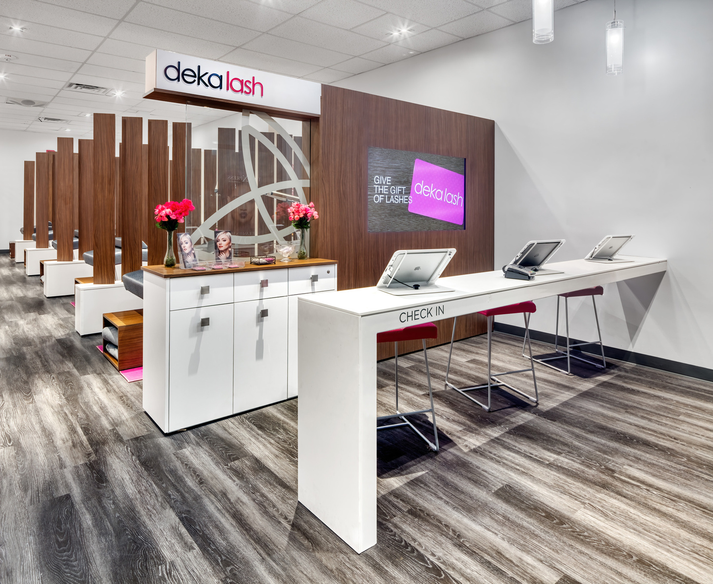 Reception area check-in counter and display wall