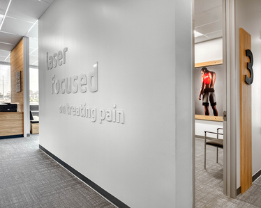 Environmental graphics and way finding signage for Ortholazer franchise.